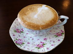 beautiful teacup with cappuccino
